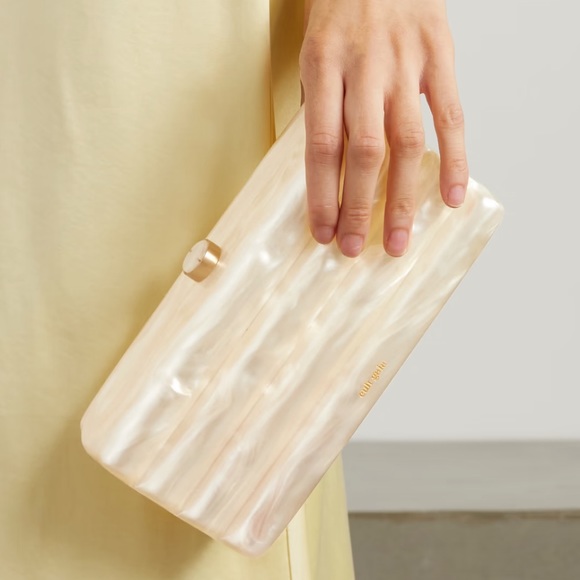 cult gaia Handbags - CULT GAIA
Enid marbled acrylic clutch